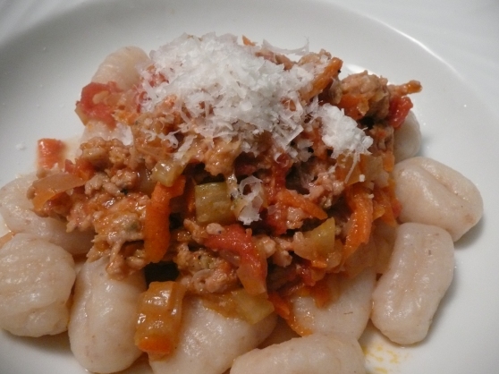The Meat Sauce Made with Sauteed Mirepoix Meat & Tomato Mixture and Gnocchi